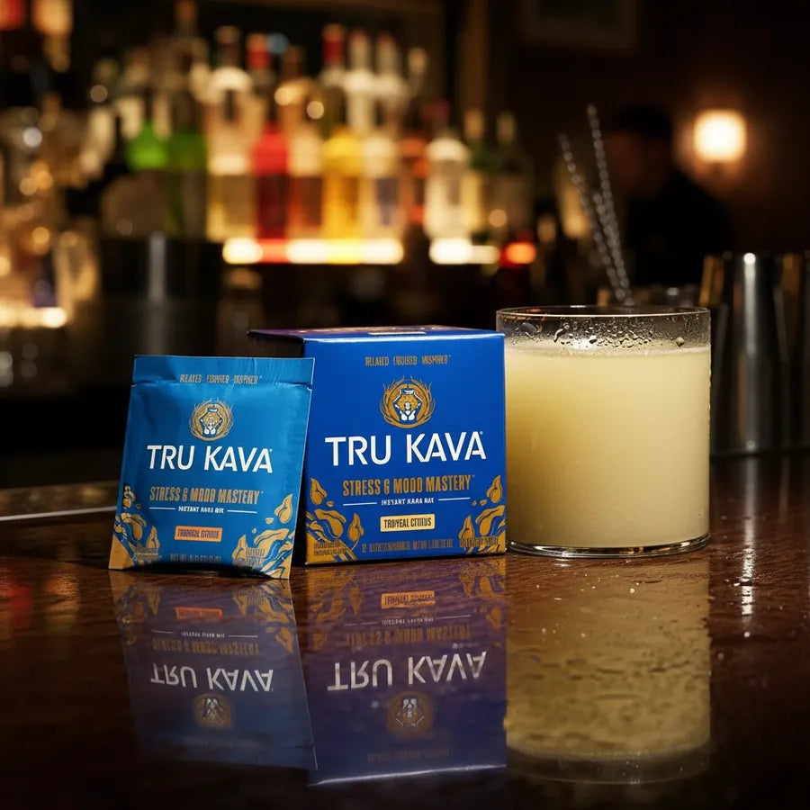 TRU KAVA box, sachet, and a prepared glass on a bar counter