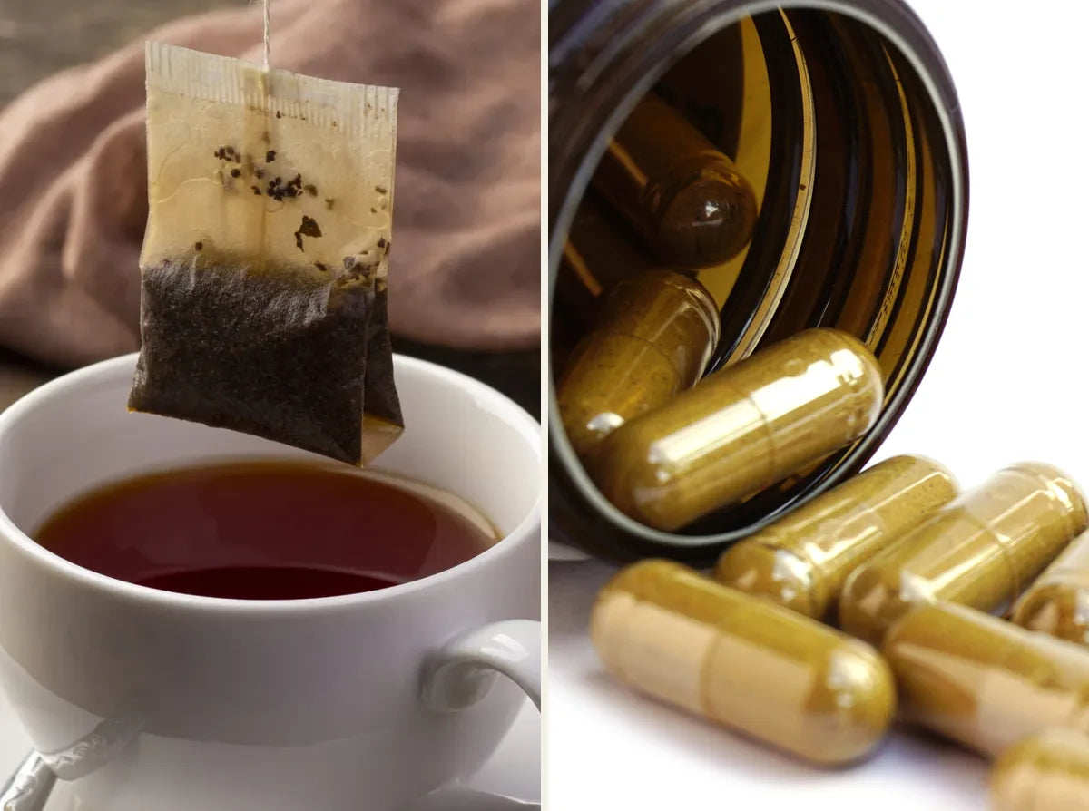 A tea bag lifted from a cup beside herbal capsules spilling from an amber jar
