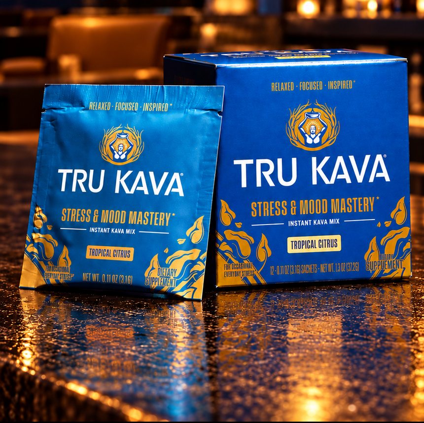 TRU KAVA Instant Kava Mix sachet and box on a bar counter at night